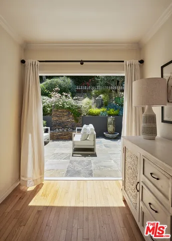 a kitchen with granite countertop a large window