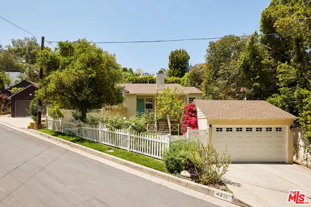 a view of a house with a garage