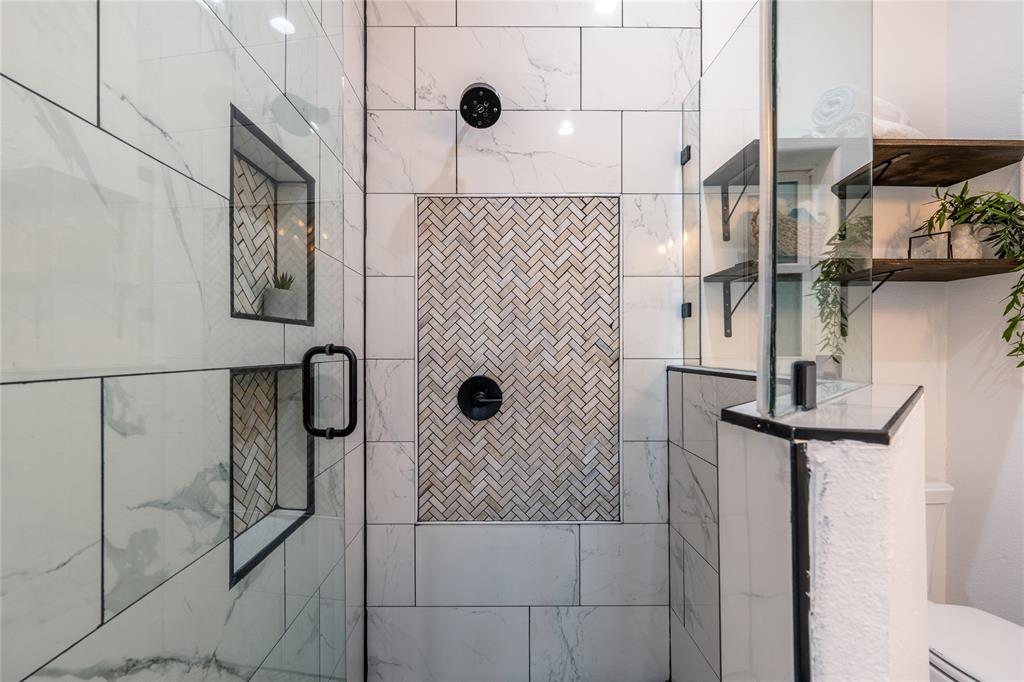 1706 County Road Sumner, TX 75486 - Photo 18 of 28 a bathroom with a shower