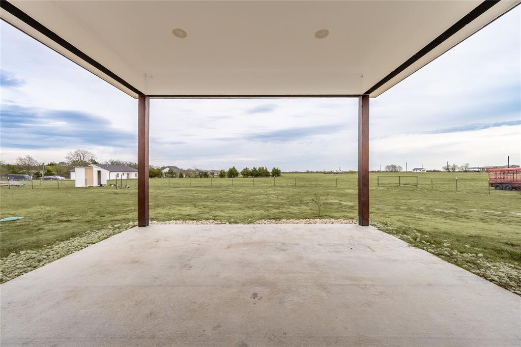1706 County Road Sumner, TX 75486 - Photo 24 of 28 a view of a lake with a big yard