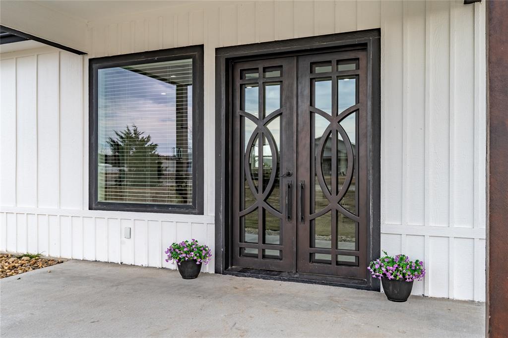 1706 County Road Sumner, TX 75486 - Photo 3 of 28 a view of a entryway door front of a house