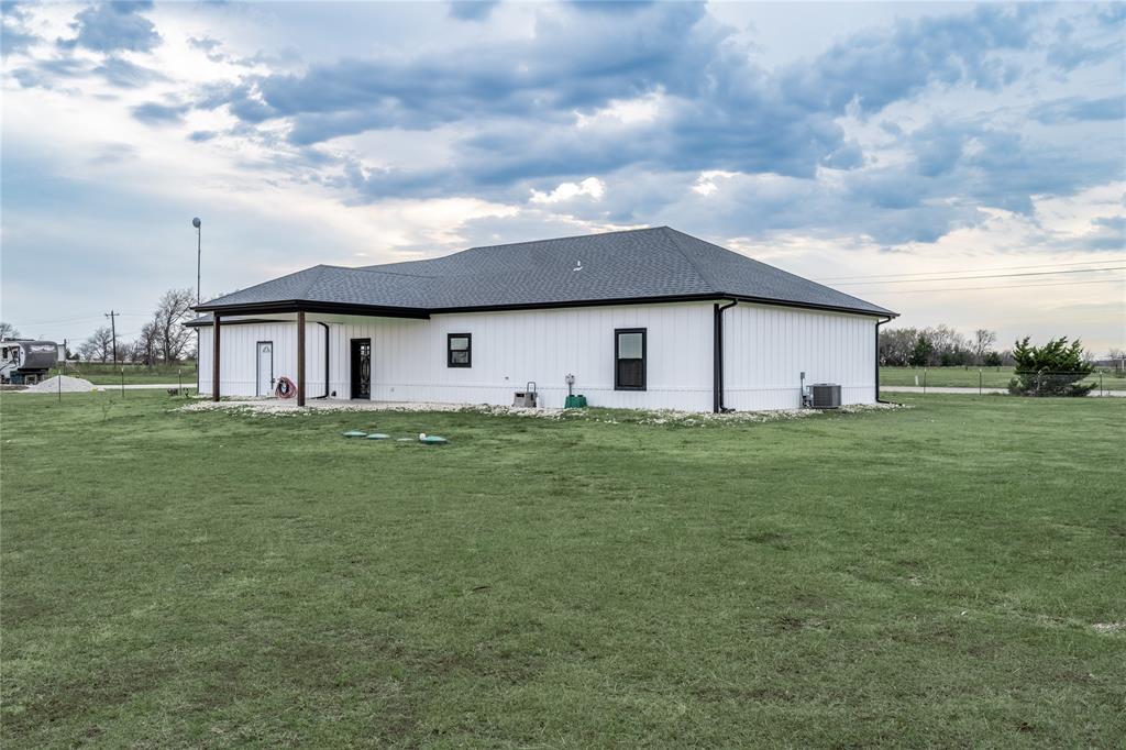 1706 County Road Sumner, TX 75486 - Photo 5 of 28 a front view of house with yard and green space