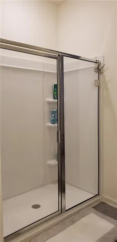 an empty room with wooden floor