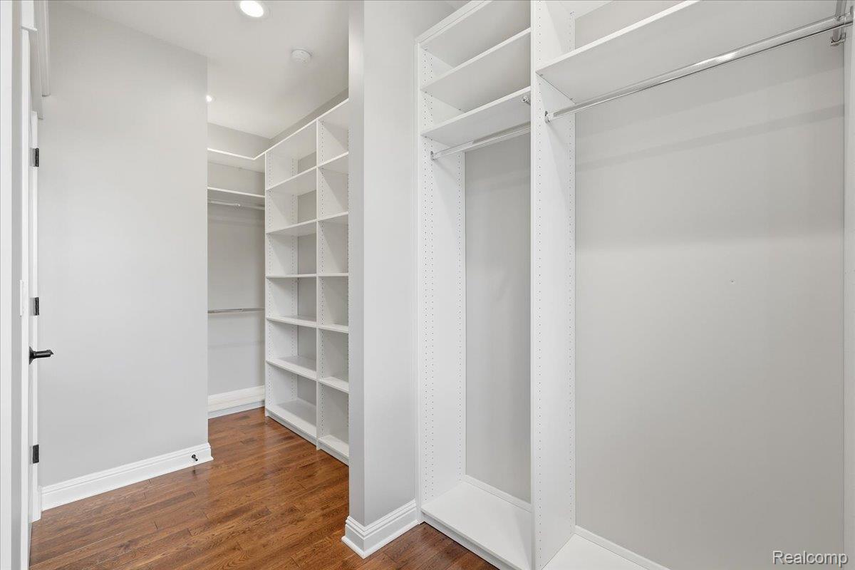 35339 West 13 Mile Road Farmington, MI 48331 - Photo 26 of 72 Primary walk in closet with wood-style flooring