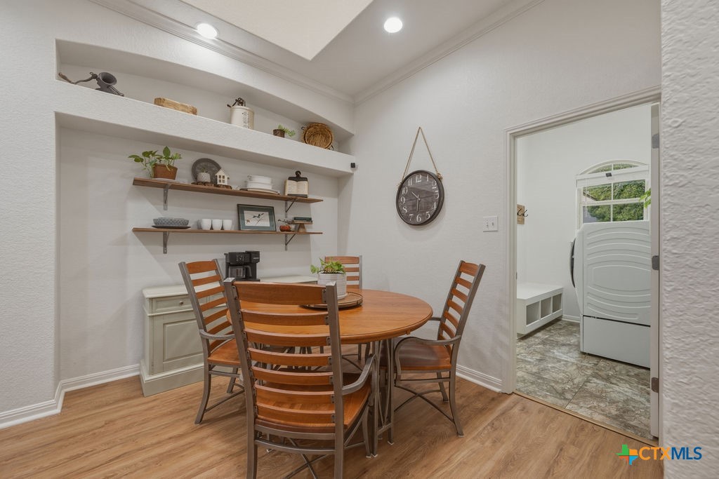 3306 Spring Canyon Road Belton, TX 76513 - Photo 21 of 40 a dining room with furniture and wooden floor