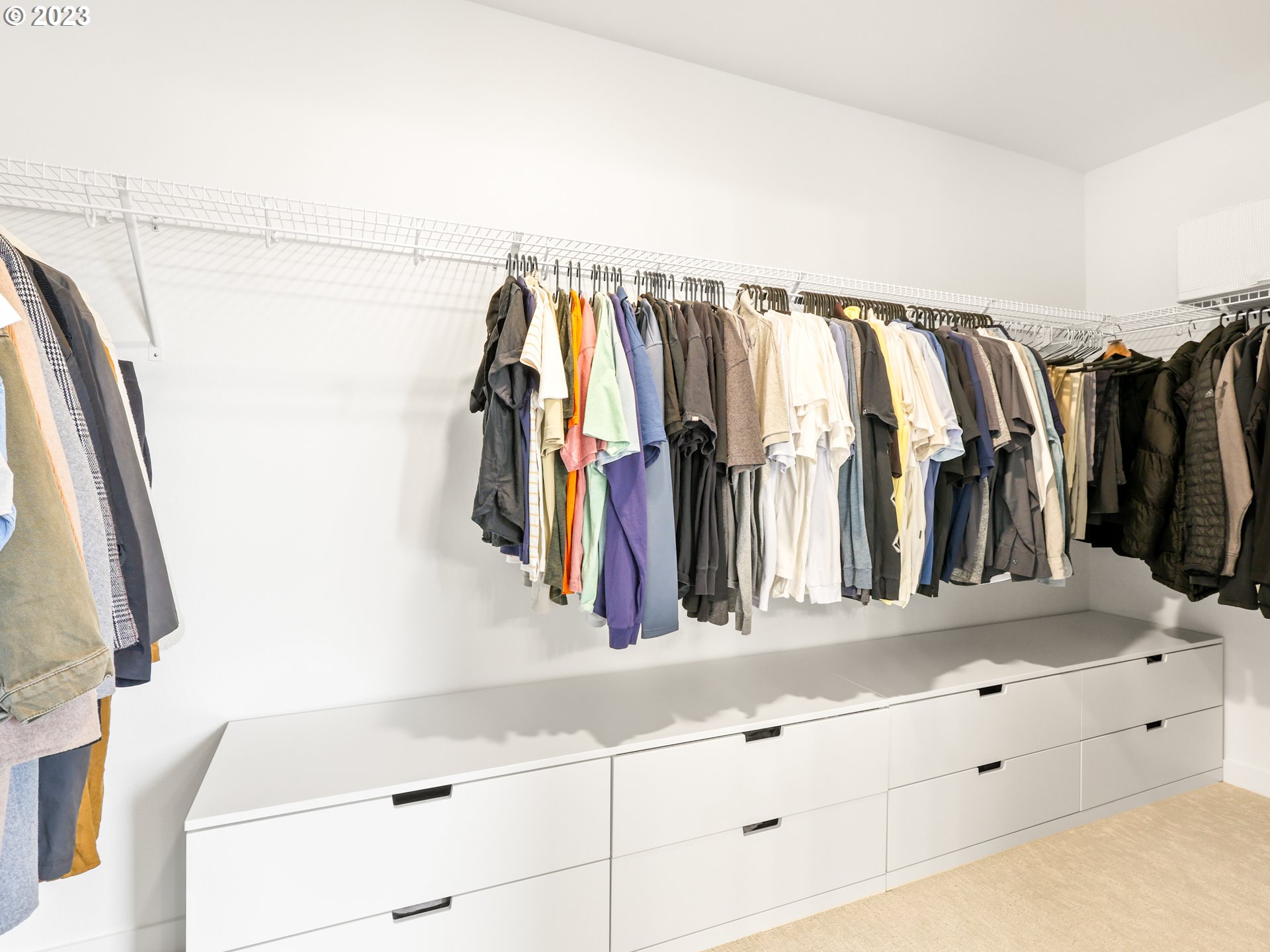 3005 North Mccanta Way Ridgefield, WA 98642 - Photo 22 of 37 a view of walk in closet with clothes and shoes
