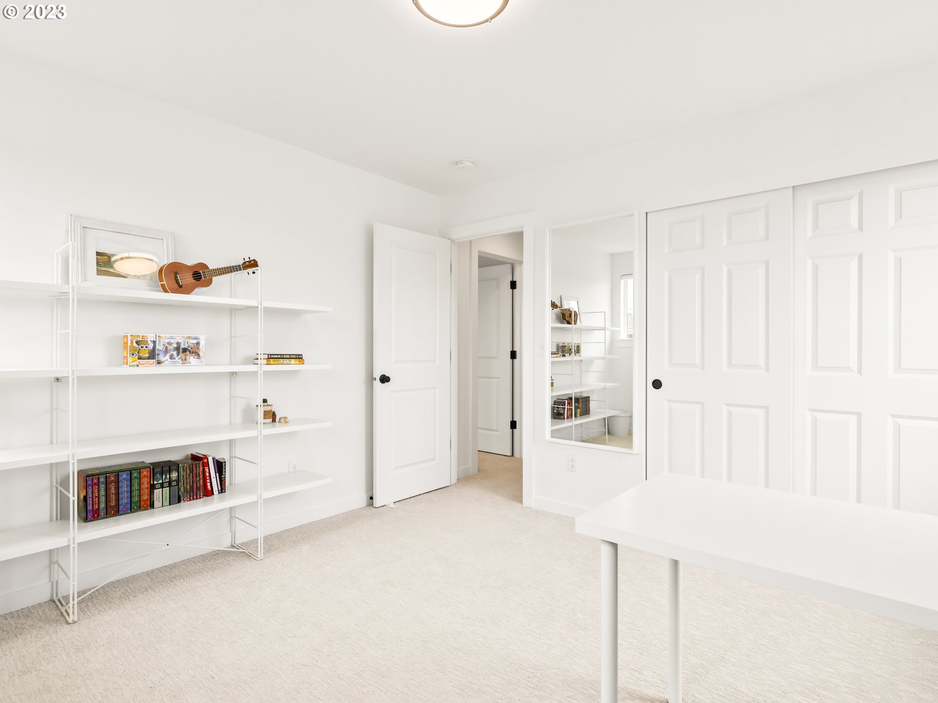 3005 North Mccanta Way Ridgefield, WA 98642 - Photo 26 of 37 a view of an empty room with shelves