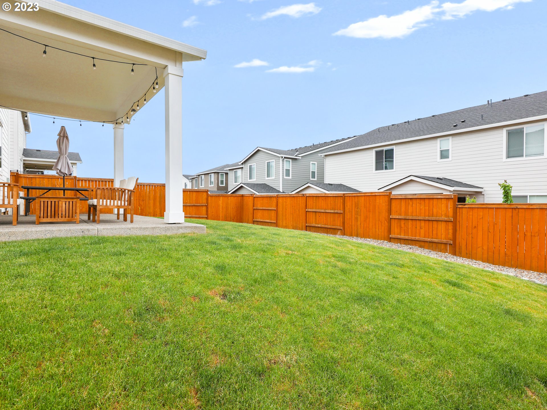 3005 North Mccanta Way Ridgefield, WA 98642 - Photo 34 of 37 a view of swimming pool with an outdoor seating