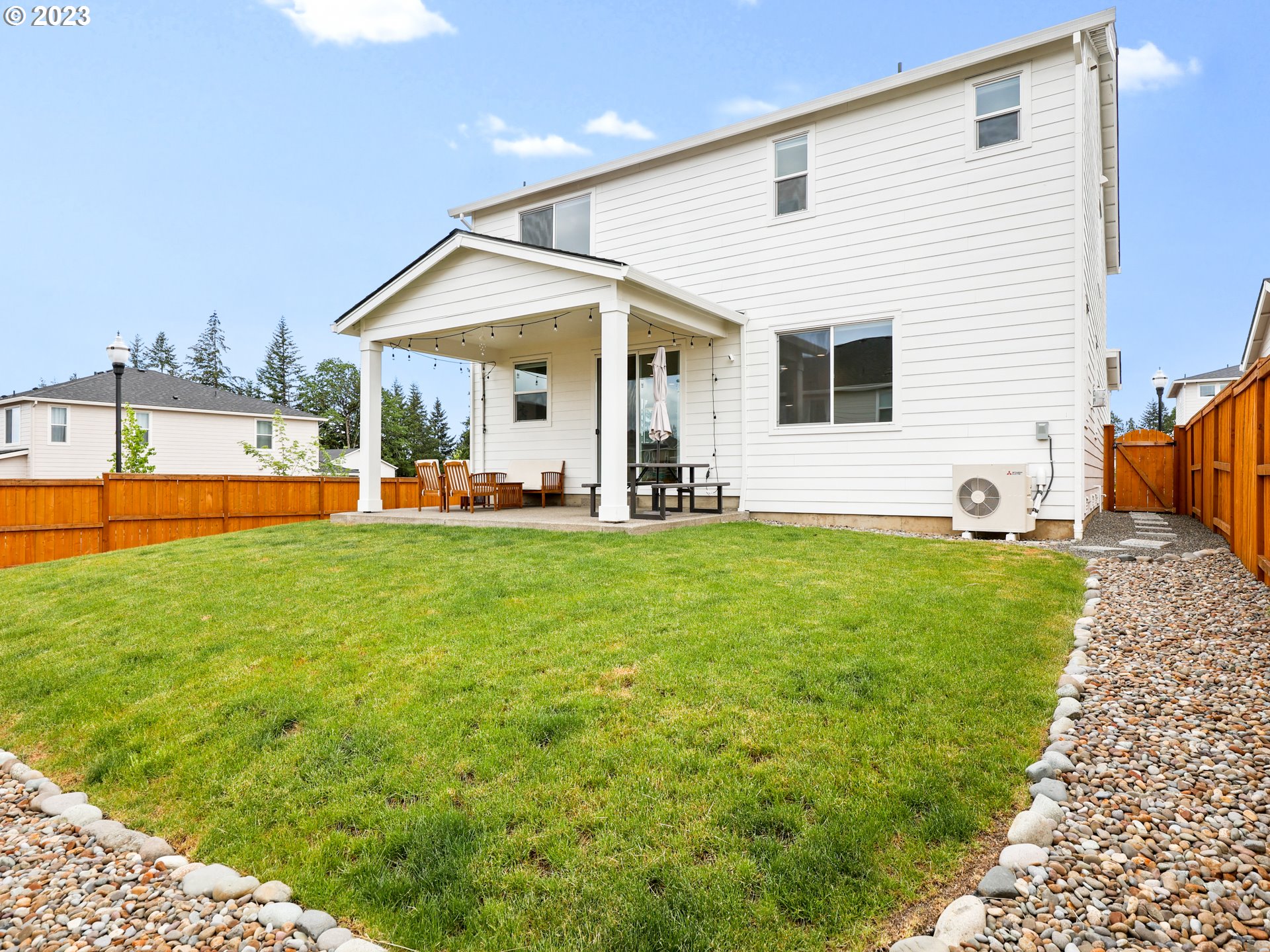 3005 North Mccanta Way Ridgefield, WA 98642 - Photo 36 of 37 a front view of house with yard and outdoor seating