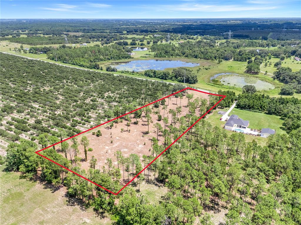 South Dewey Robbins Road Howey-in-the-Hills, FL 34737 - Photo 6 of 9 a view of a city with an ocean