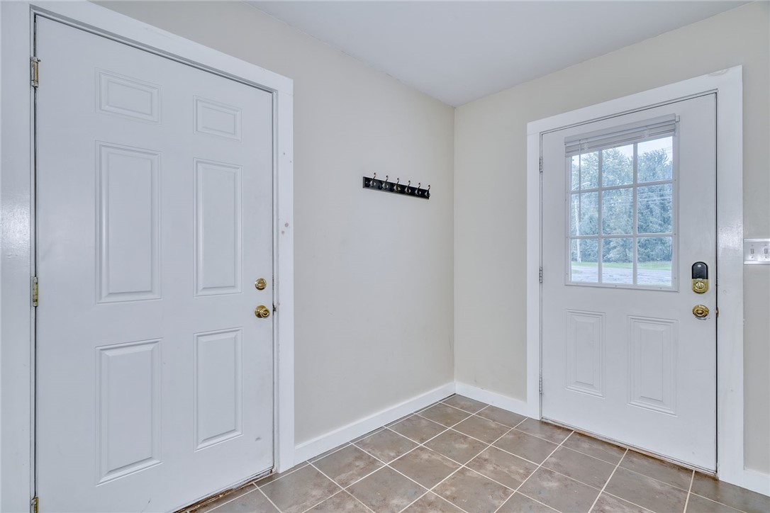1252 State Road Webster, NY 14580 - Photo 20 of 43 MUDROOM - GARAGE & FRT ENTRY DOOR