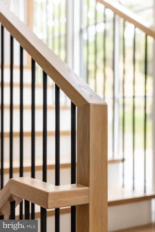 a view of staircase with large window