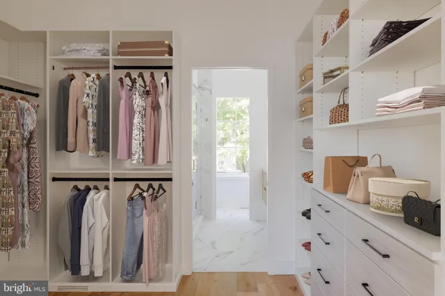 a bathroom with a sink and a window