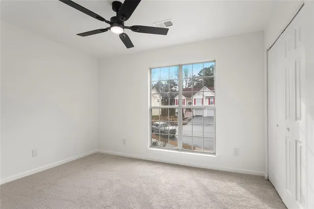 an empty room with windows