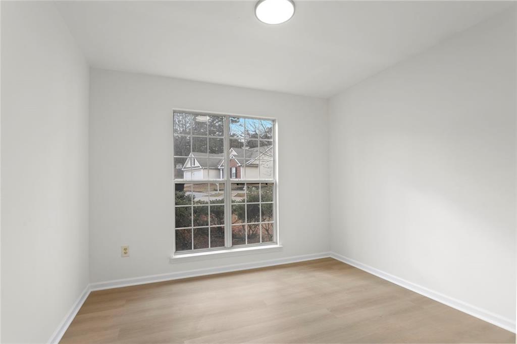 6608 Chesepeake Trail Rex, GA 30273 - Photo 23 of 32 a view of an empty room with a window