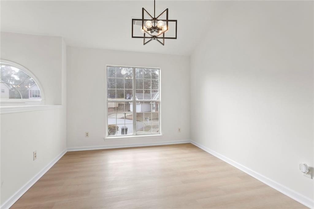 6608 Chesepeake Trail Rex, GA 30273 - Photo 8 of 32 an empty room with a window