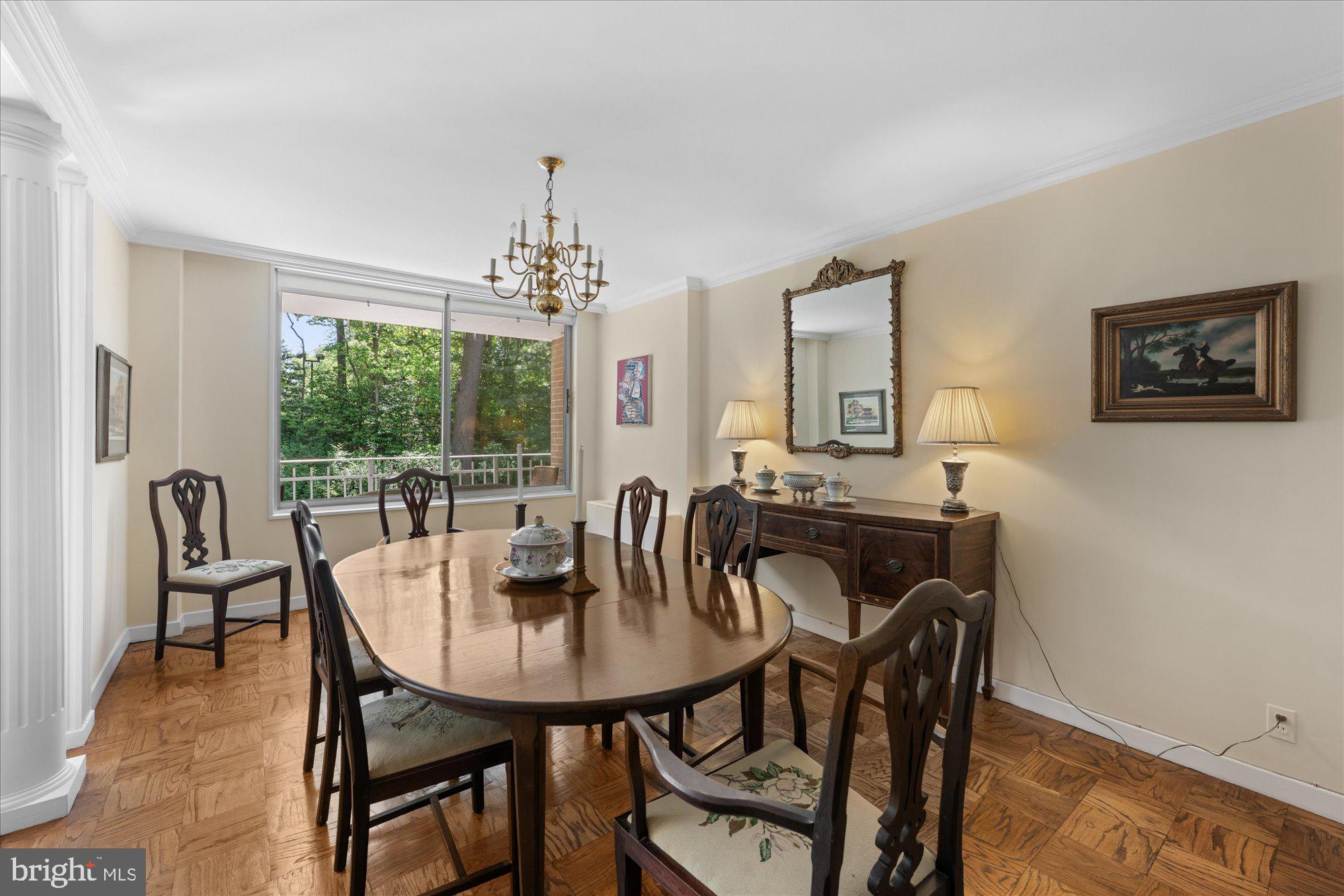 4100 Cathedral Avenue Northwest, Unit 717 Washington, DC 20016 - Photo 14 of 34 a view of a dining room with furniture window and outside view