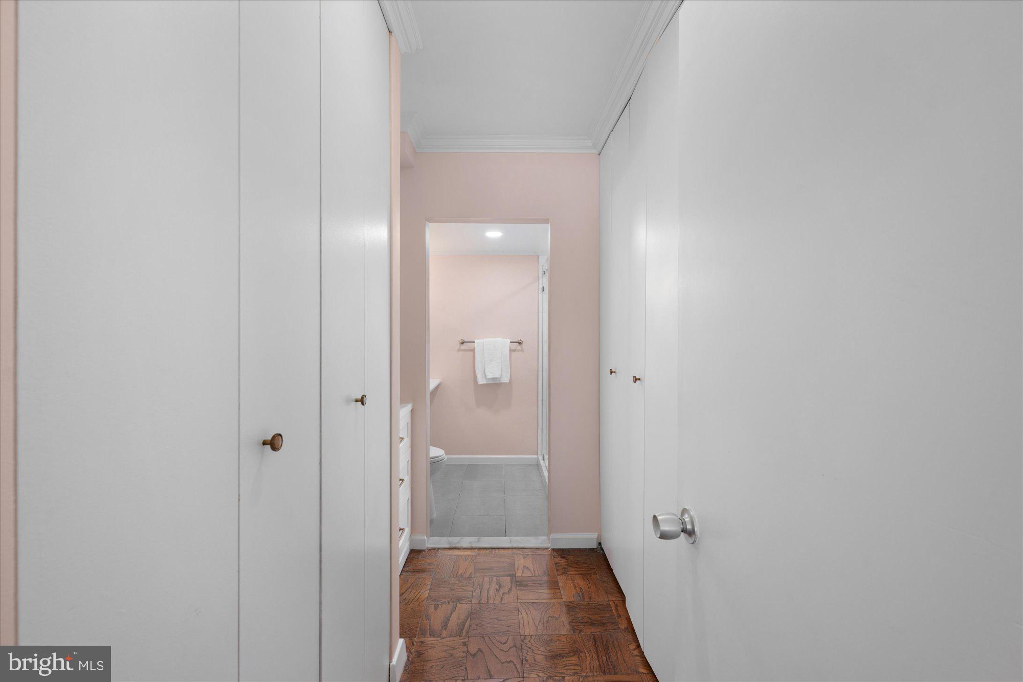 4100 Cathedral Avenue Northwest, Unit 717 Washington, DC 20016 - Photo 25 of 34 a view of a bathroom from a hallway