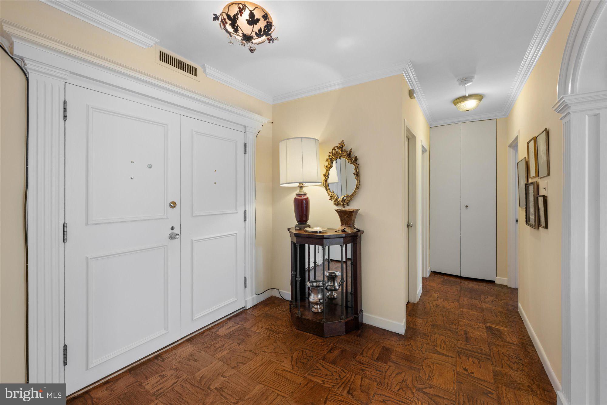 4100 Cathedral Avenue Northwest, Unit 717 Washington, DC 20016 - Photo 4 of 34 a view of a hallway to a livingroom and a hallway