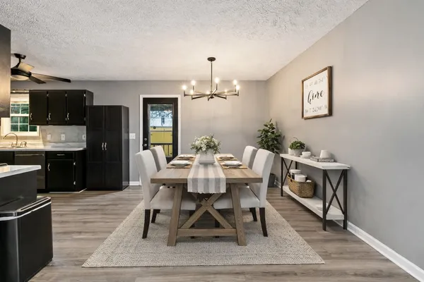 a view of a dining room with furniture