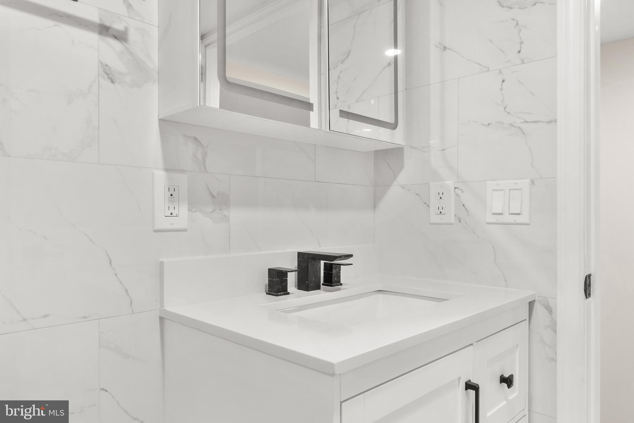 5516 Catharine Street Philadelphia, PA 19143 - Photo 31 of 44 full bathroom in basement