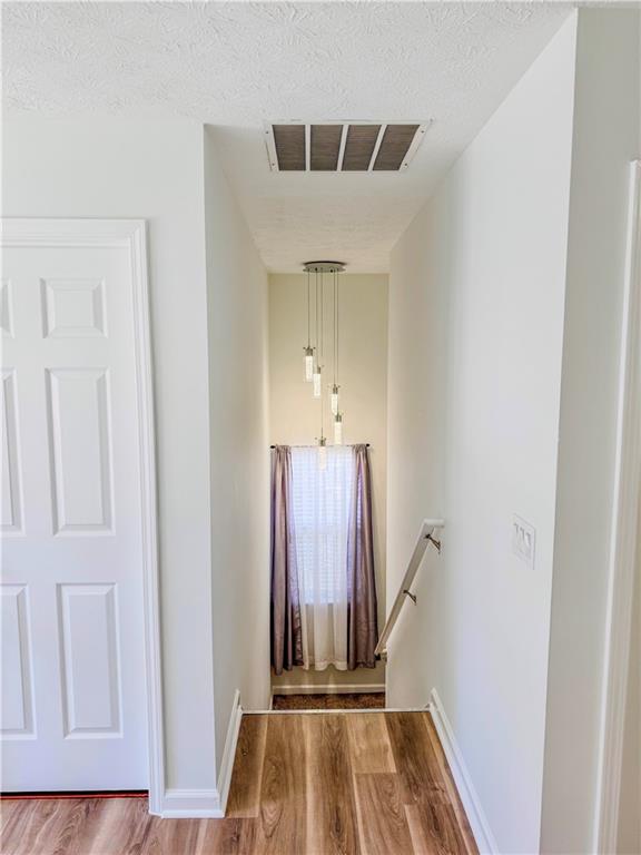 1559 Woodmore Road Southwest Marietta, GA 30008 - Photo 25 of 43 a view of entryway with wooden floor