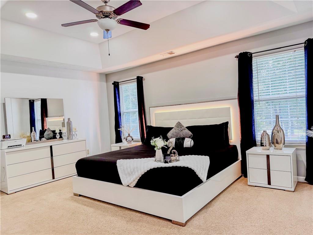 1559 Woodmore Road Southwest Marietta, GA 30008 - Photo 30 of 43 a living room with furniture and a fireplace