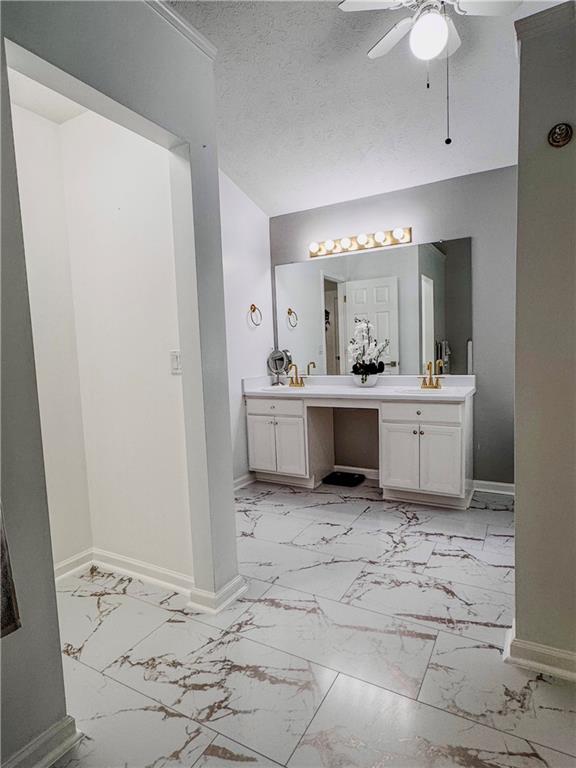 1559 Woodmore Road Southwest Marietta, GA 30008 - Photo 33 of 43 a room with a sink and cabinets