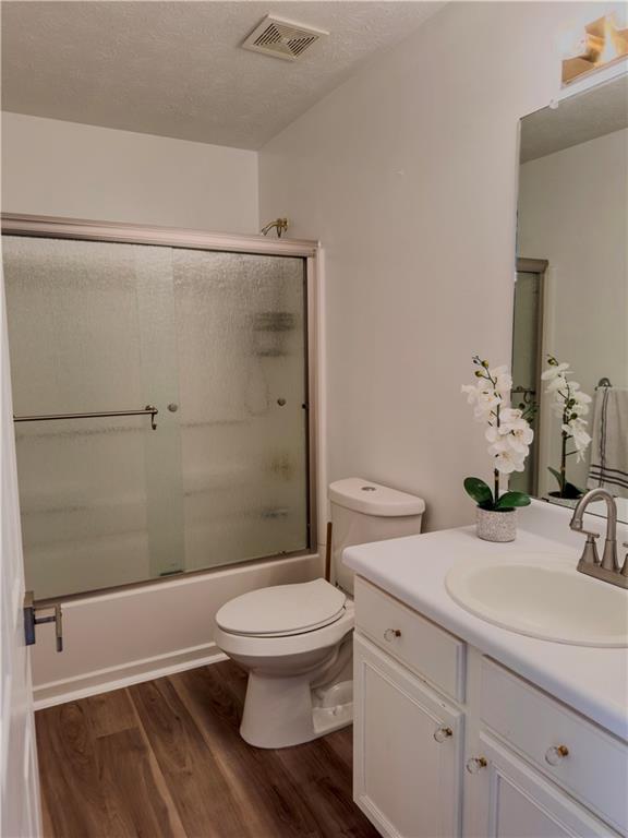 1559 Woodmore Road Southwest Marietta, GA 30008 - Photo 38 of 43 a bathroom with a sink toilet and shower