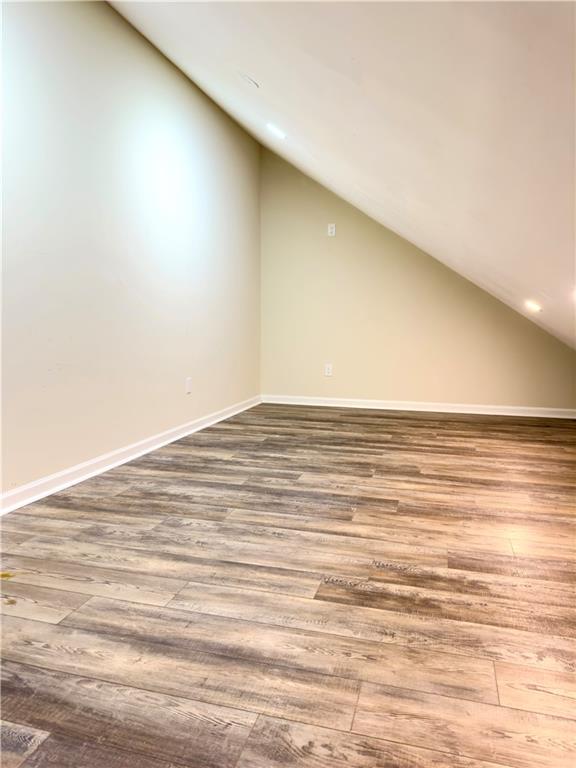 1559 Woodmore Road Southwest Marietta, GA 30008 - Photo 41 of 43 a view of empty room with wooden floor