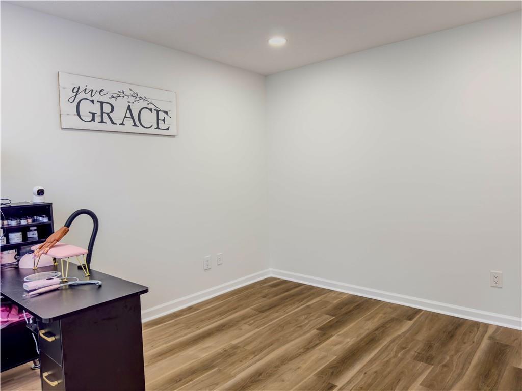 1559 Woodmore Road Southwest Marietta, GA 30008 - Photo 9 of 43 a view of a workspace with furniture