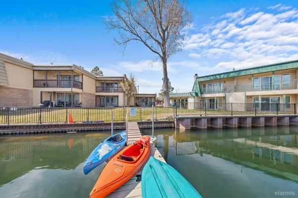 a view of a lake with building next to a lake