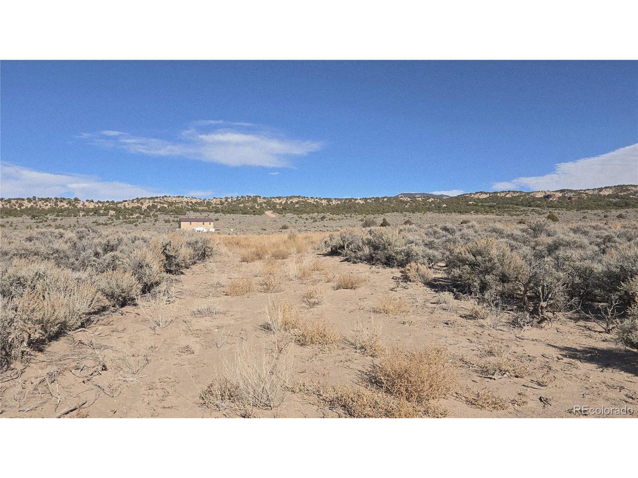1768 Bateman Road Fort Garland, CO 81133 - Photo 28 of 30 a black and white photo of a road