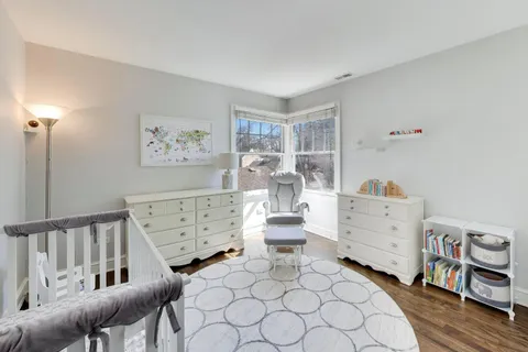 a living room with furniture and decor
