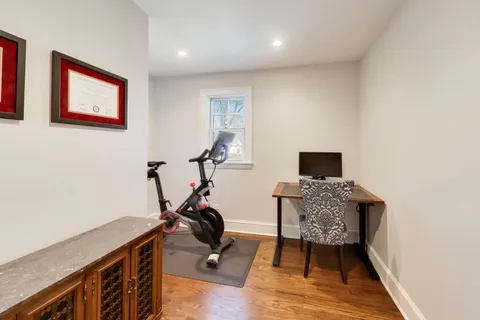 a room with furniture and wooden floor