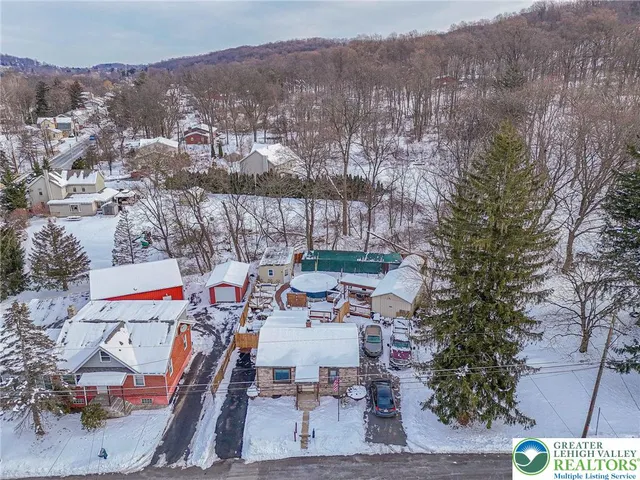 an aerial view of a city with lots of residential buildings