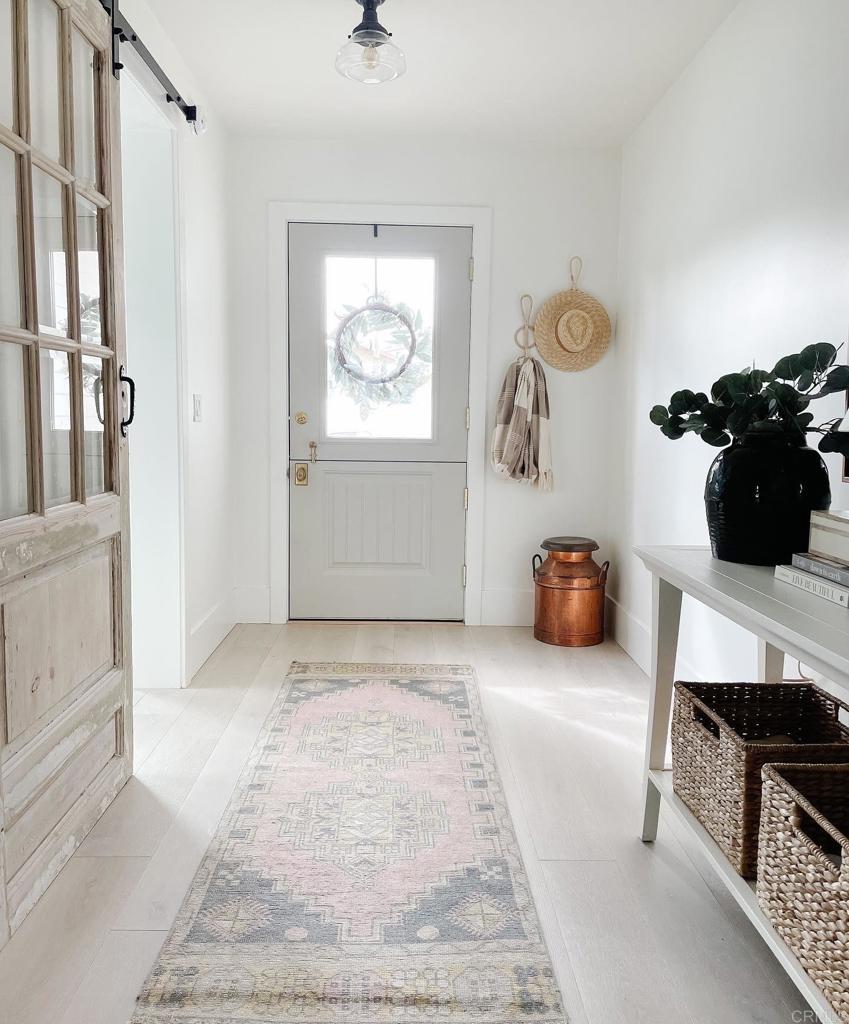 436 Alviso Way Encinitas, CA 92024 - Photo 5 of 18 a living room with furniture and a window