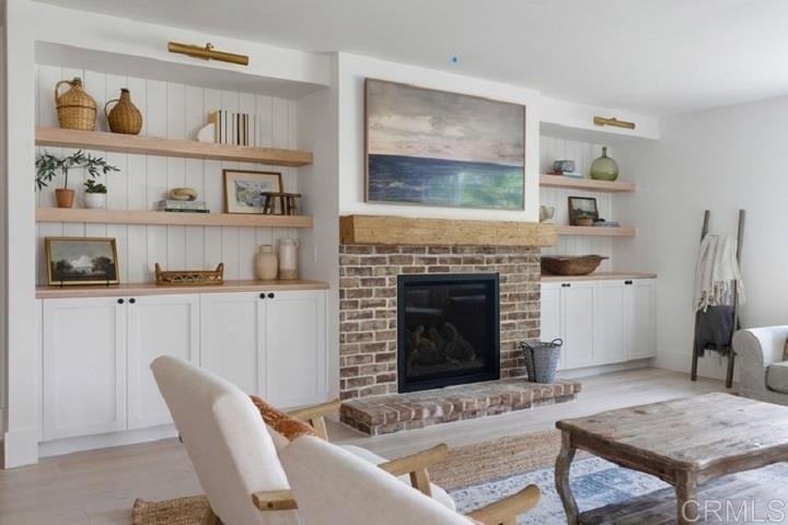 436 Alviso Way Encinitas, CA 92024 - Photo 9 of 18 a living room with furniture and a fireplace