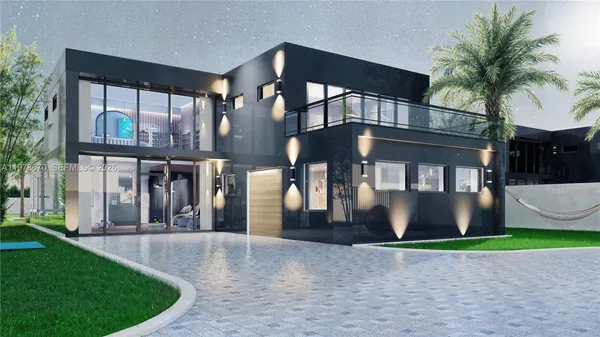 a front view of building with yard and green space