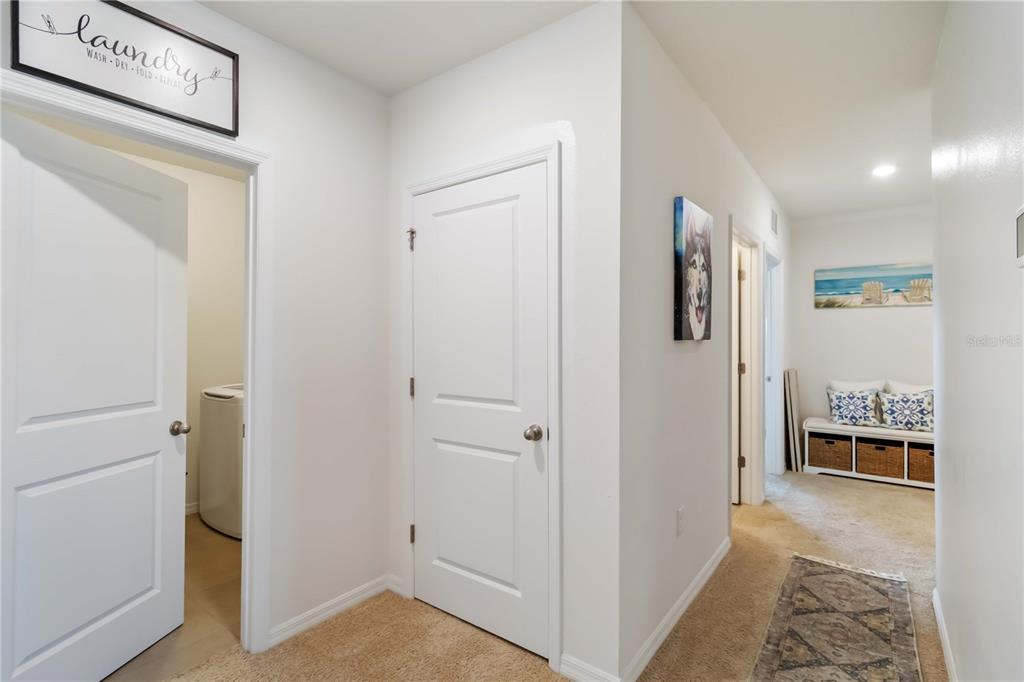 5904 Silver Sage Way Sarasota, FL 34232 - Photo 32 of 43 a view of a hallway with dining area