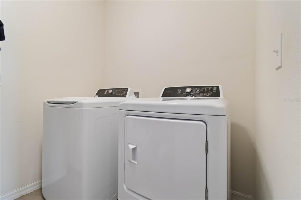 5904 Silver Sage Way Sarasota, FL 34232 - Photo 35 of 43 a utility room with dryer and washer