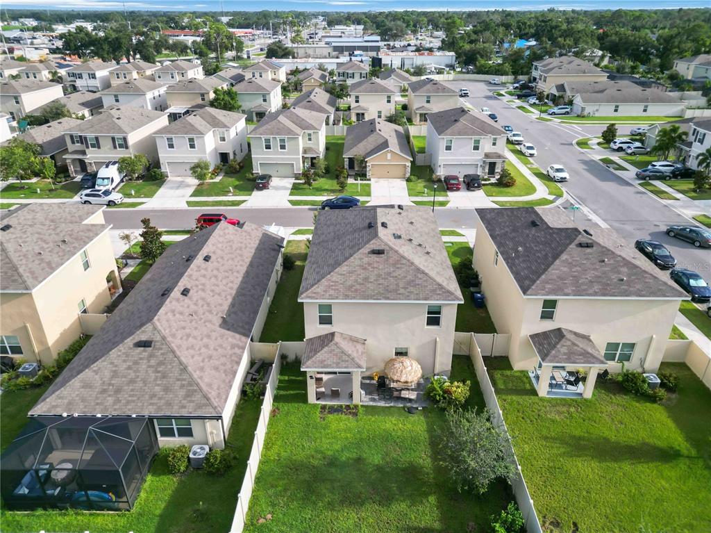 5904 Silver Sage Way Sarasota, FL 34232 - Photo 42 of 43 an aerial view of multiple houses with yard