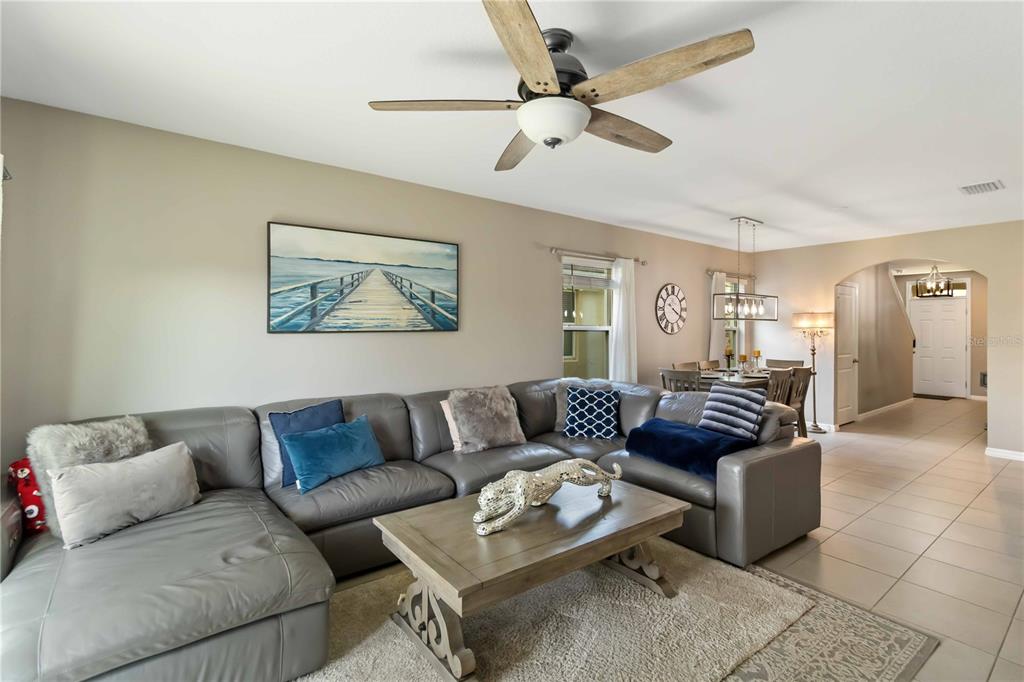 5904 Silver Sage Way Sarasota, FL 34232 - Photo 8 of 43 a living room with furniture and a couch