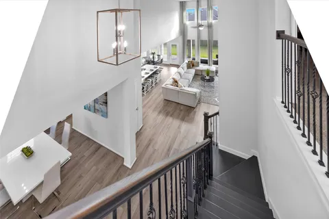 a view of a living room and dining room