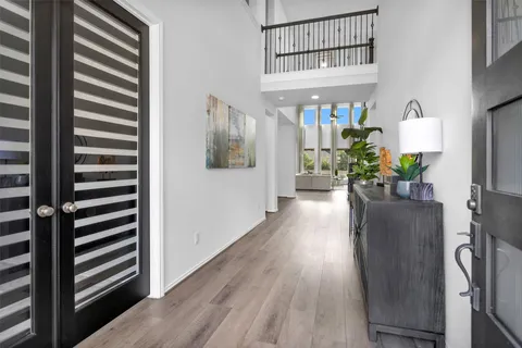 a hallway with wooden floor