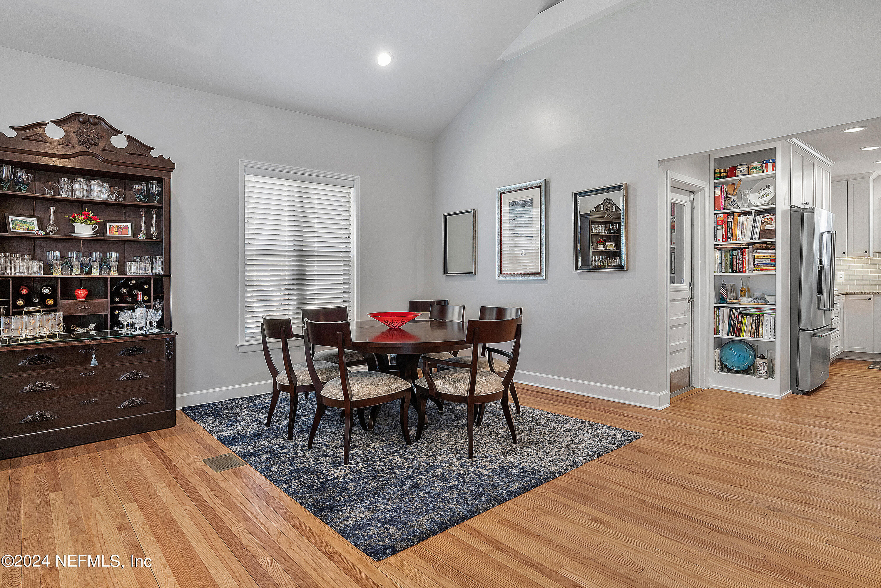 4724 Devon Lane Jacksonville, FL 32210 - Photo 15 of 40 a view of a dining room with furniture and wooden floor