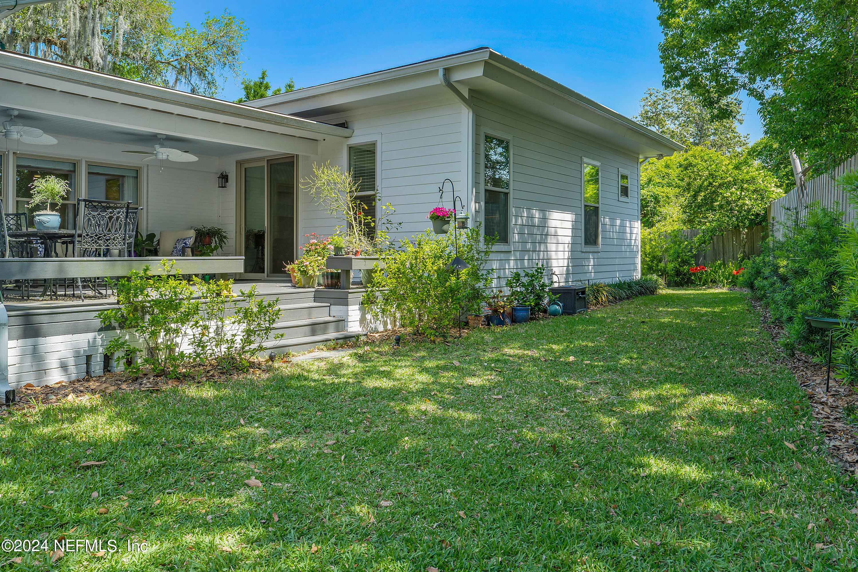 4724 Devon Lane Jacksonville, FL 32210 - Photo 29 of 40 a front view of house with yard and green space