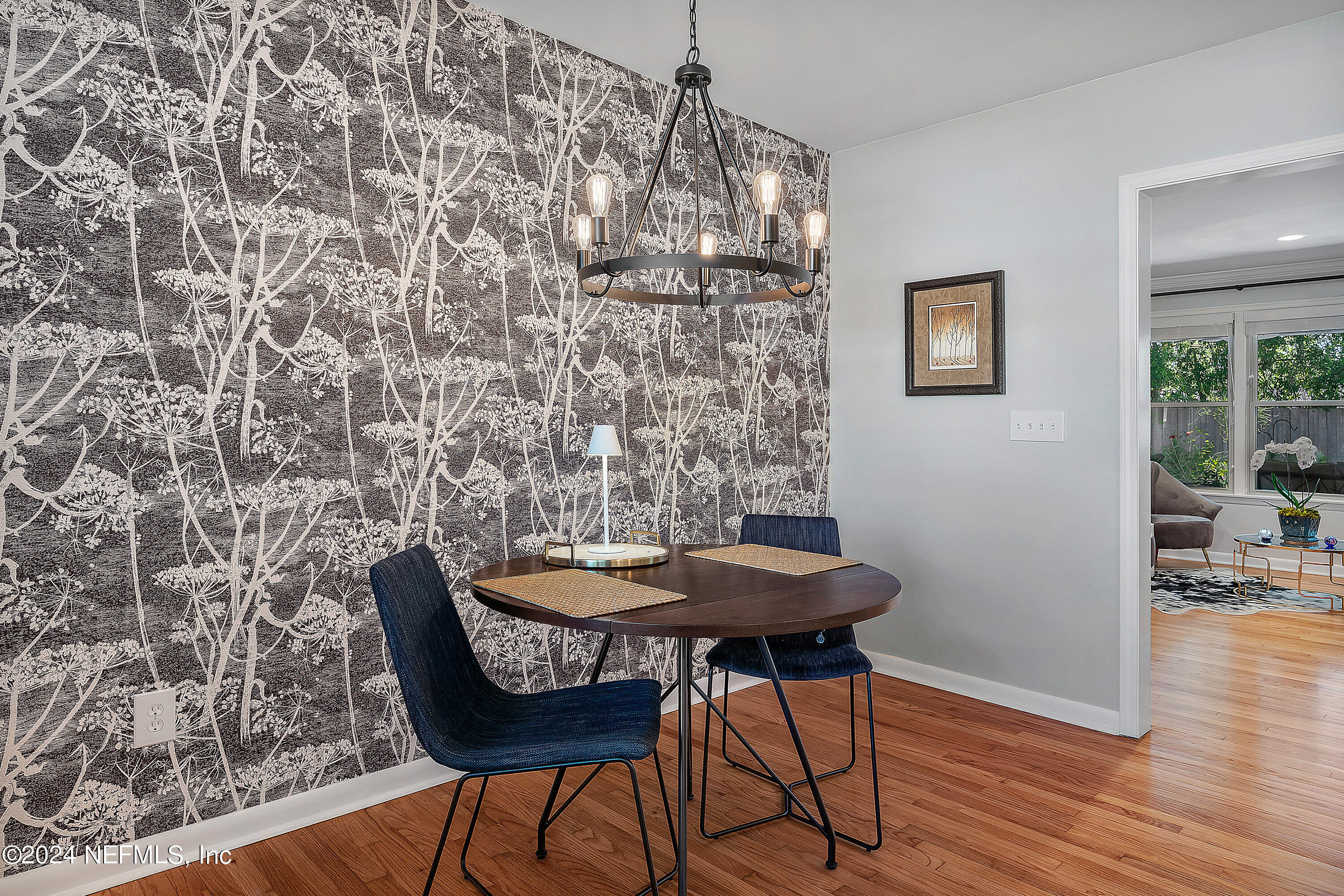 4724 Devon Lane Jacksonville, FL 32210 - Photo 10 of 40 a view of a dining room with furniture and wooden floor
