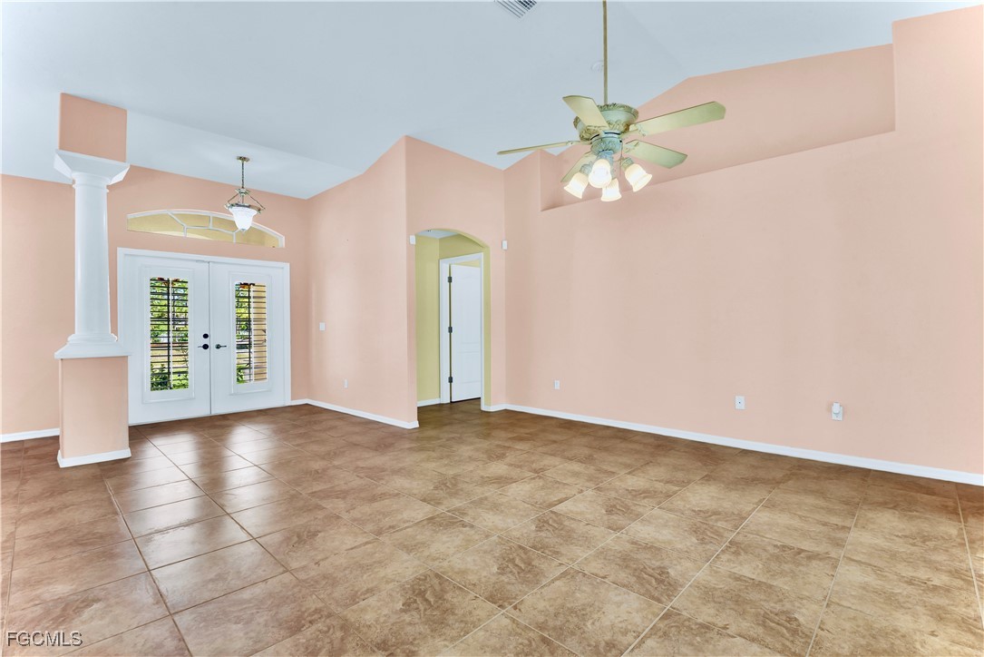909 Magnolia Avenue Lehigh Acres, FL 33972 - Photo 16 of 38 a view of an empty room with a window