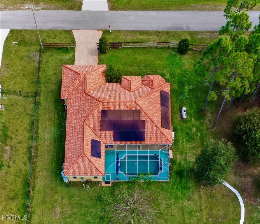909 Magnolia Avenue Lehigh Acres, FL 33972 - Photo 5 of 38 a aerial view of a house